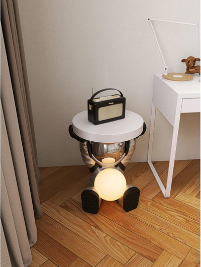 Astronautentisch mit rundem Tischplatte 19,7" x 17,7" Sofa-Beistelltisch mit Mondlampe Moderner Harz-Akzent Astronautenfigur für Schlafzimmer, Wohnzimmer, Zuhause, Rosa